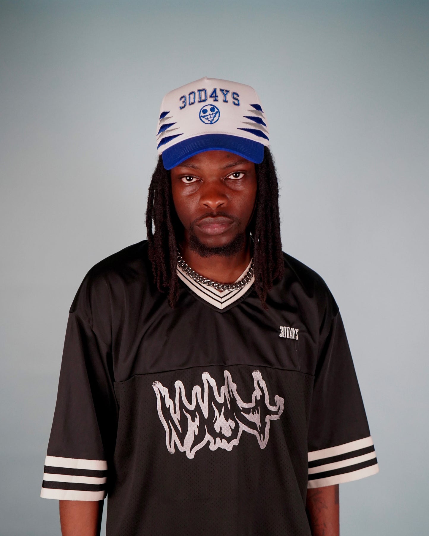 "FAKE SMILE" DIAMOND CUT SNAPBACK HAT