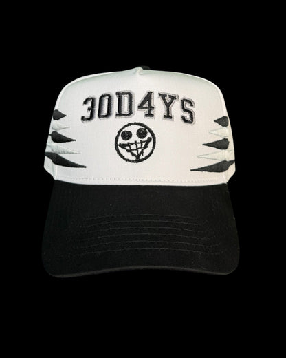 "FAKE SMILE" DIAMOND CUT SNAPBACK HAT